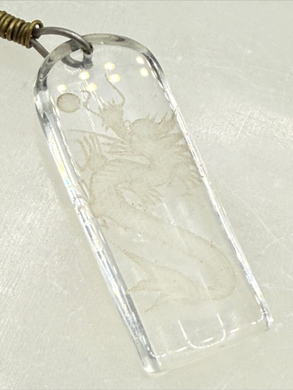 Vintage Clear Dragon-Engraved Resin Pendant